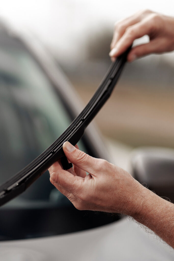 Changing wiper blade on car
