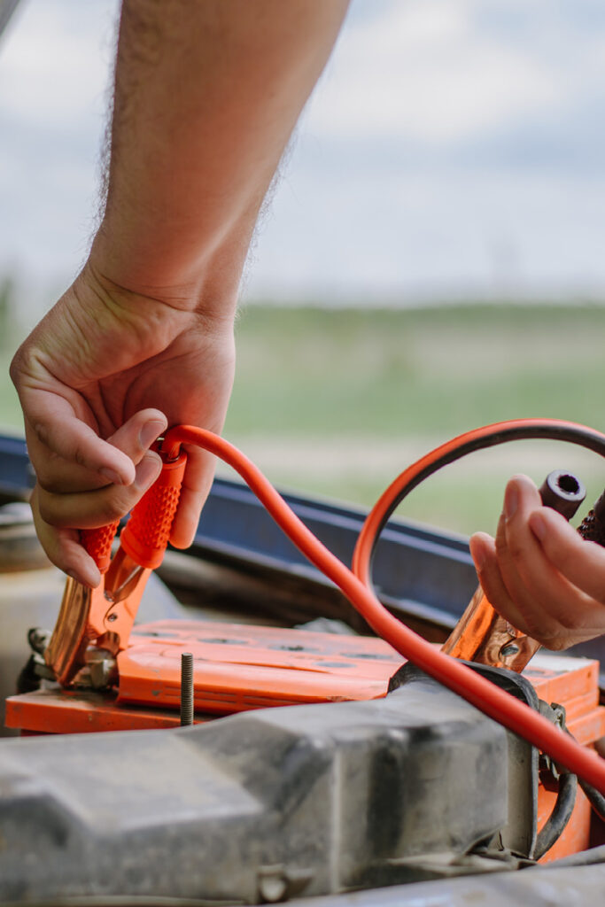 Attaching jump leads to car battery