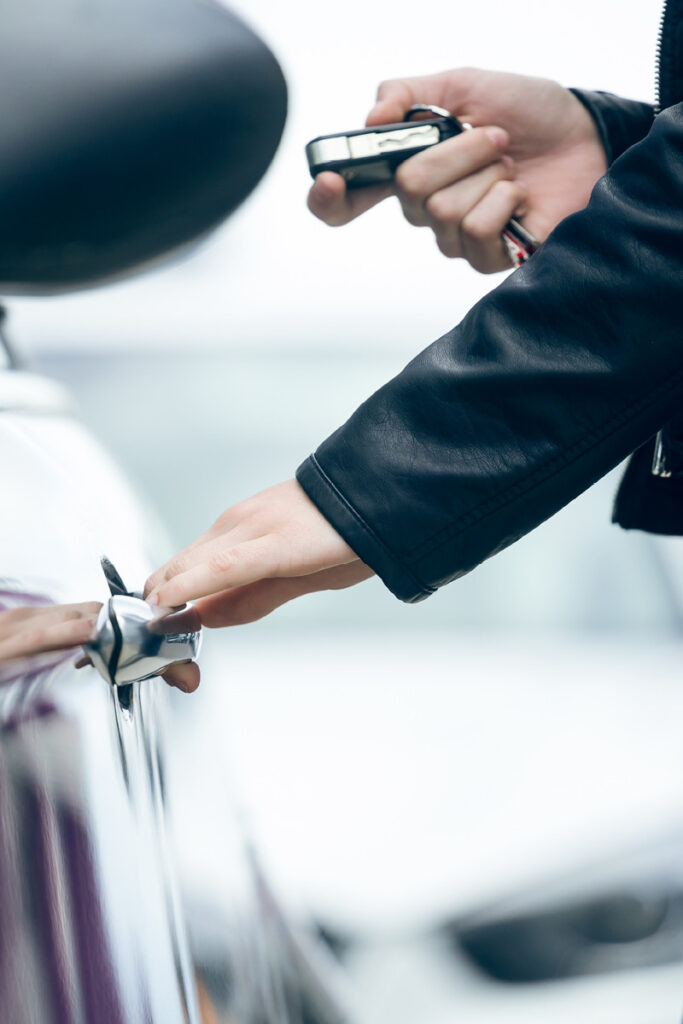 Female opening car using key fob