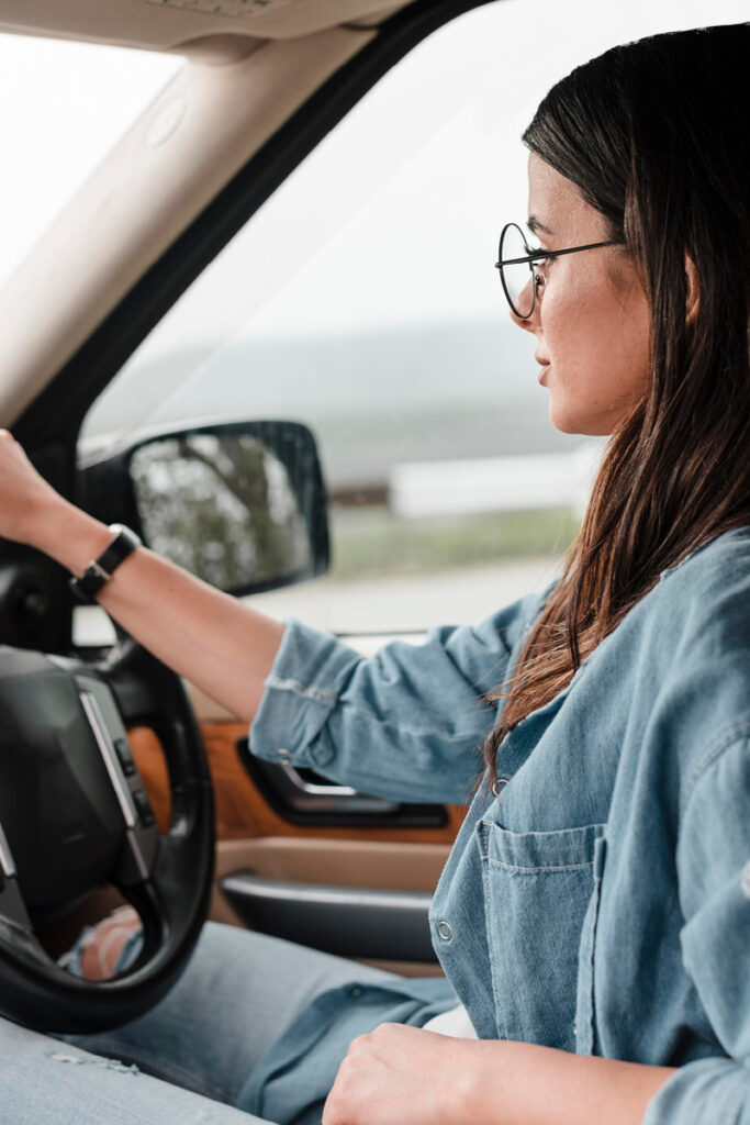 Female driving SUV