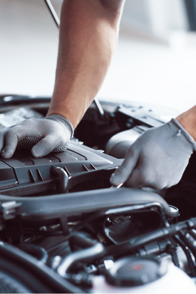 Mechanic working on engine