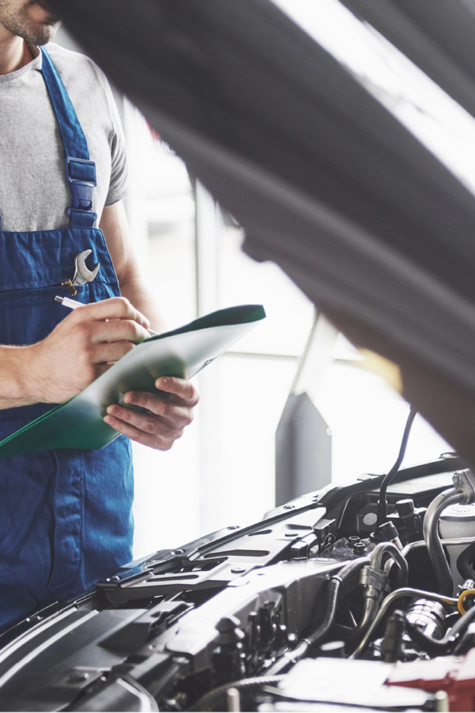 Everything you need to know about Car MOT - Thumbnail | Warrantywise Mechanic inspecting car engine