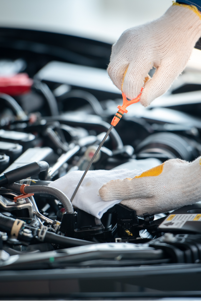 Checking engine oil dip stick