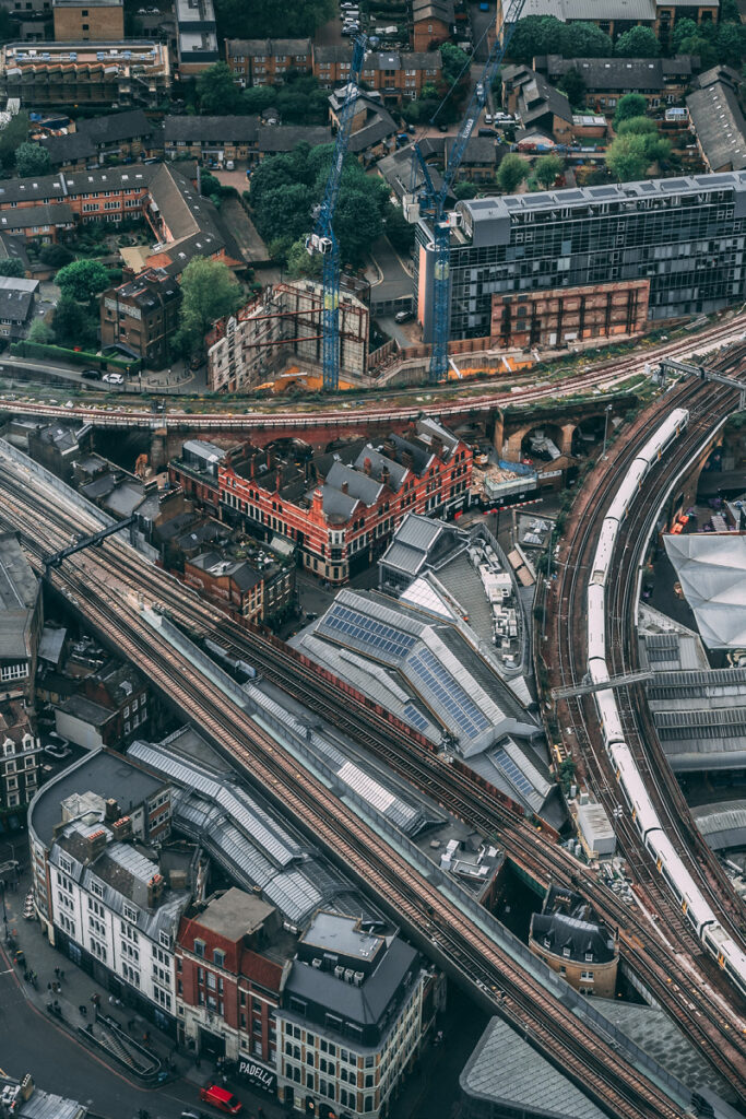 Which UK towns and cities will have to pay a congestion charge - Thumbnail | Warrantywise Aerial drone shot of city roads
