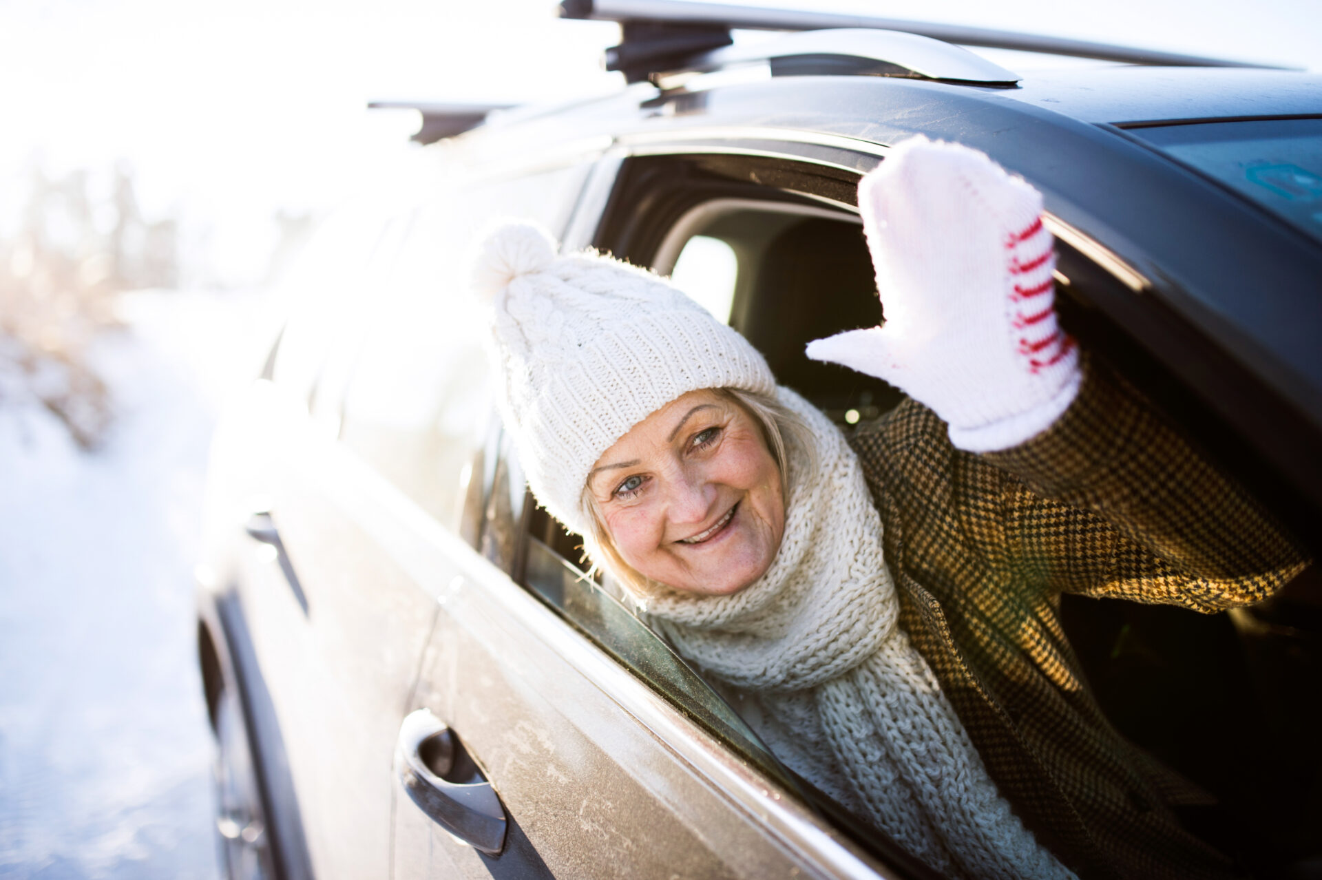 senior-woman-in-winter-clothes-in-a-car-waving-2025-10-10-20-45-29-utc | Warrantywise