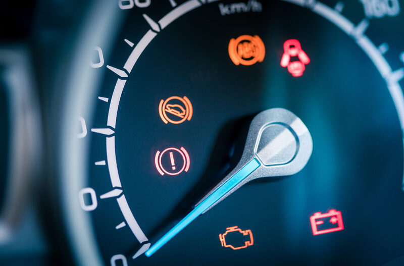 Close upo of car dashboard warning lights