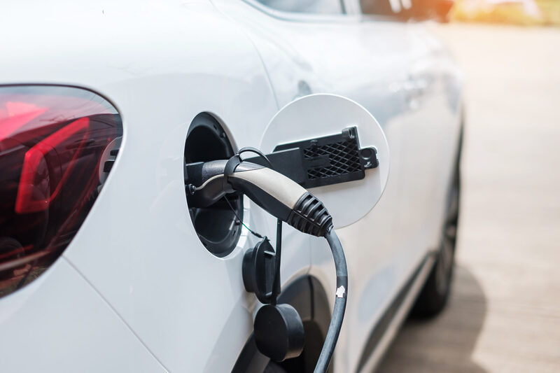 Electric car charging battery at EV charger