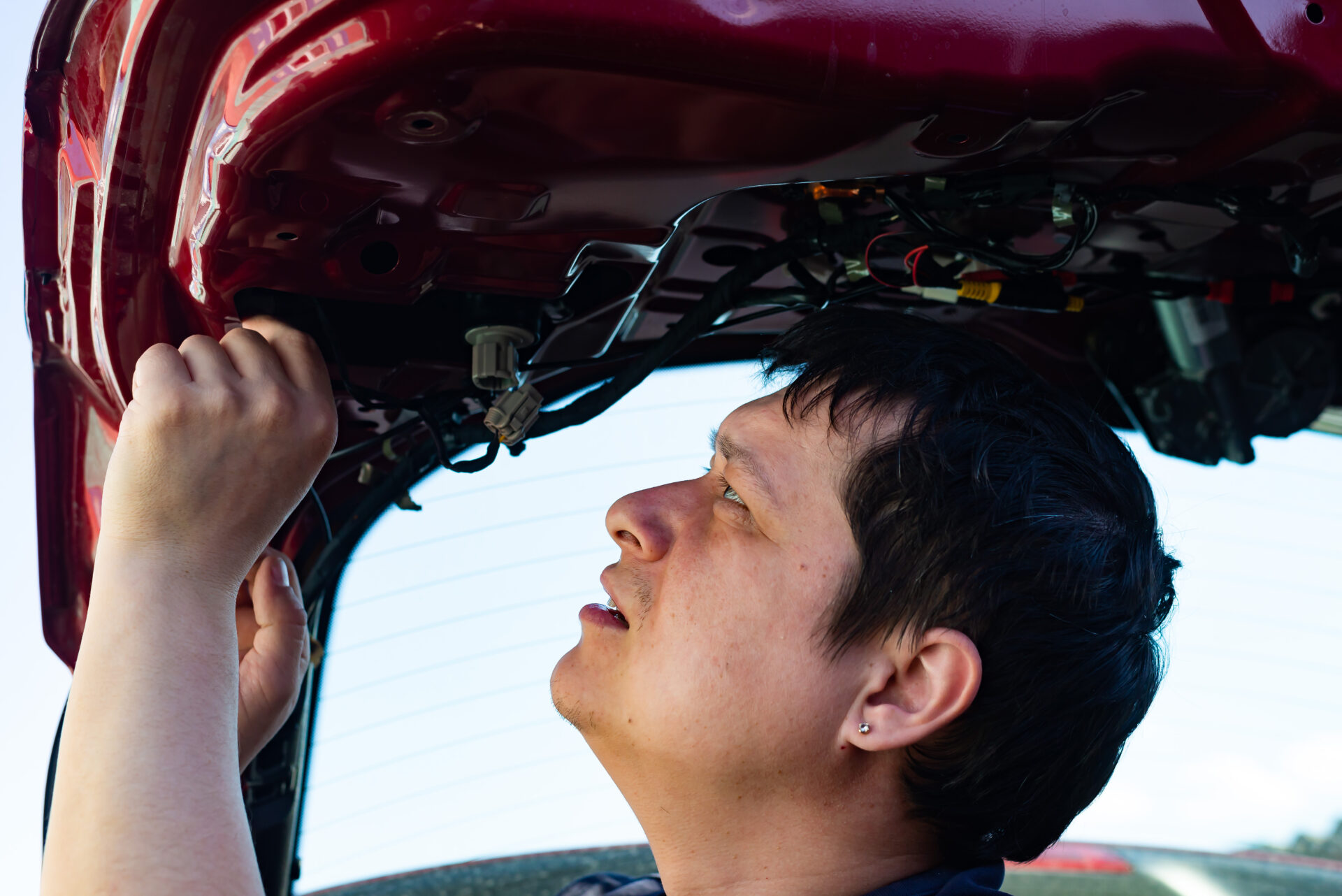 a-young-man-repairs-a-car-by-himself-repair-work-2025-01-08-02-20-47-utc | Warrantywise
