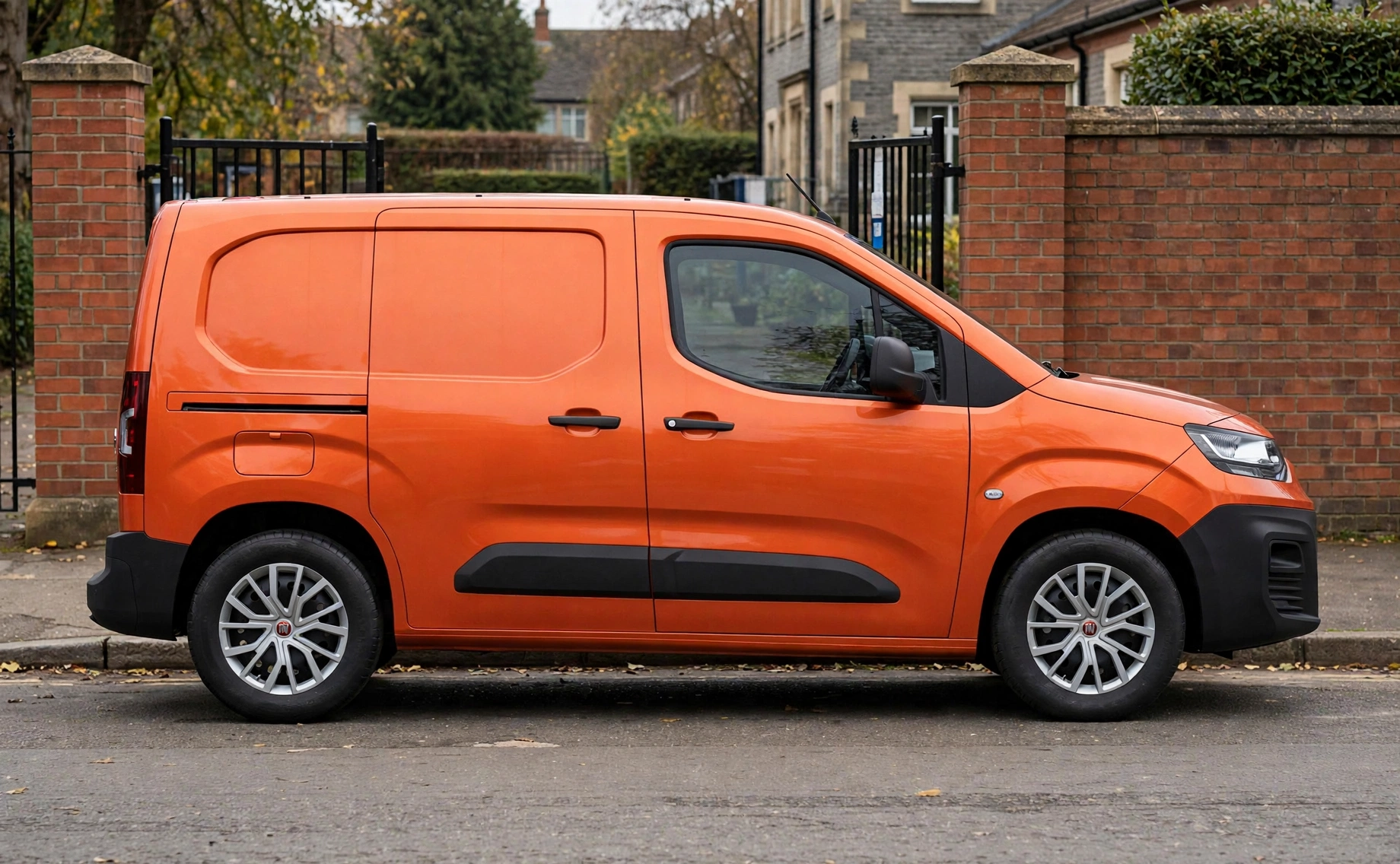 orange_van_brick_wall | Warrantywise